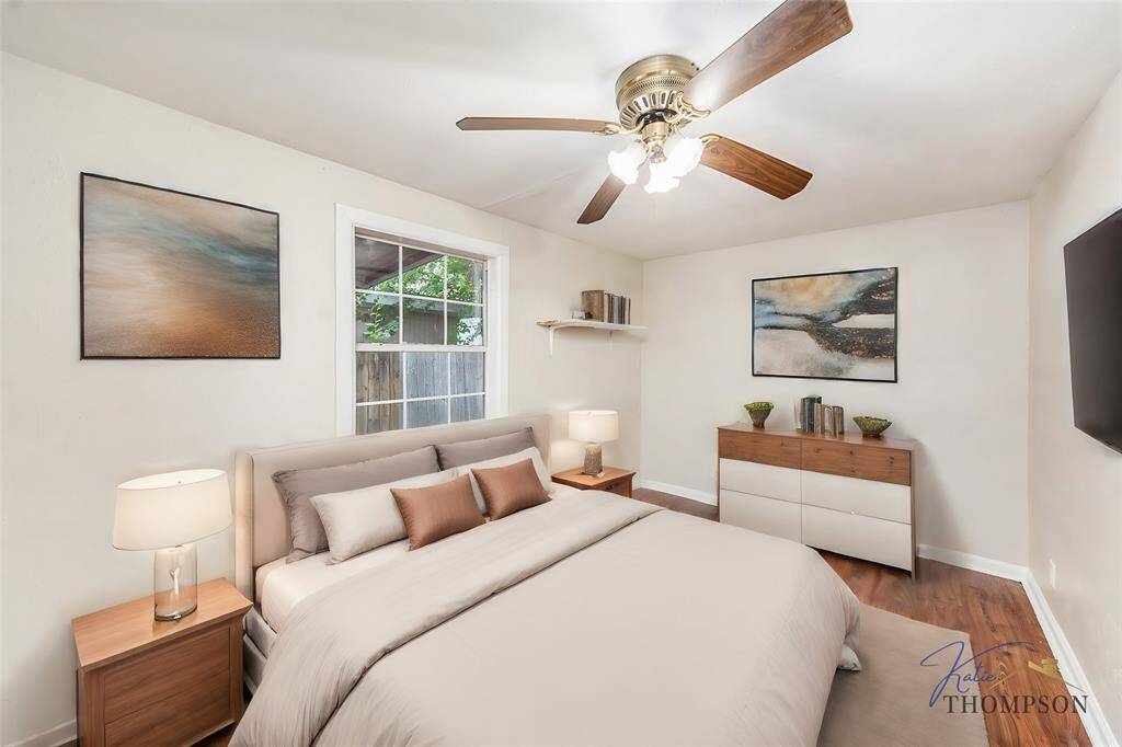 Virtually staged photo of the front bedroom.