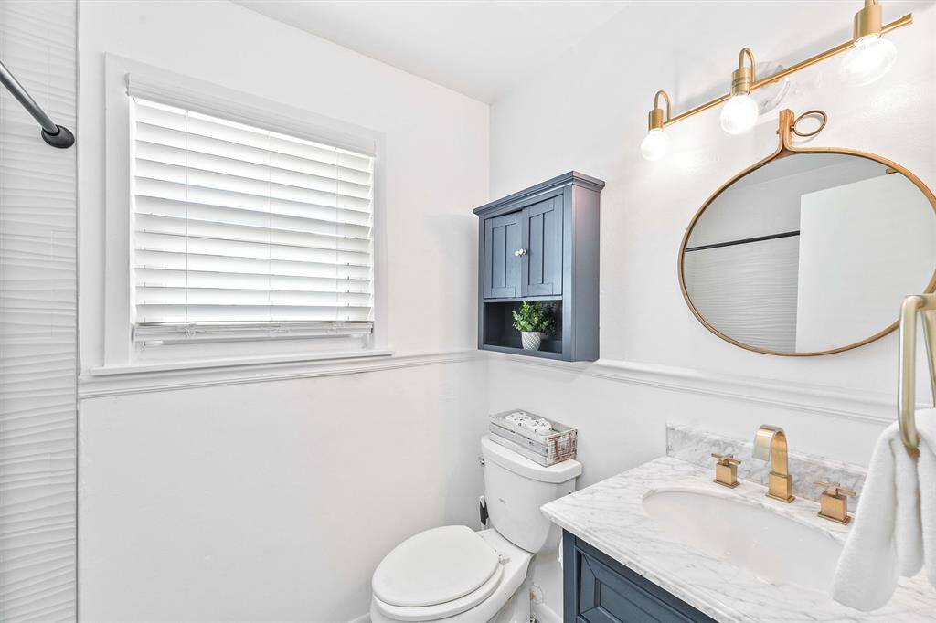Updated bathroom with tiled walk in shower.