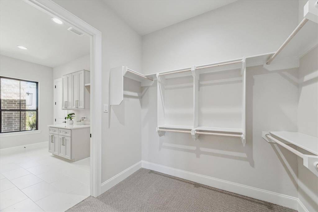 1 (of 2) Primary Closet connects to the Utility Room