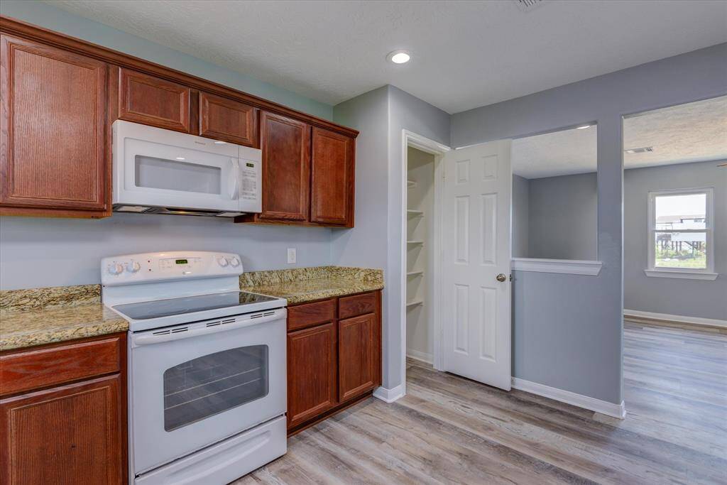 Kitchen has a nice sized pantry.