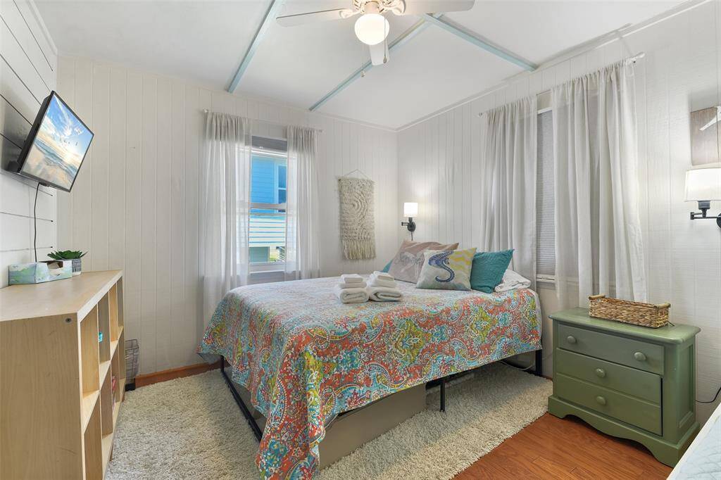 The second bedroom sleeps six.