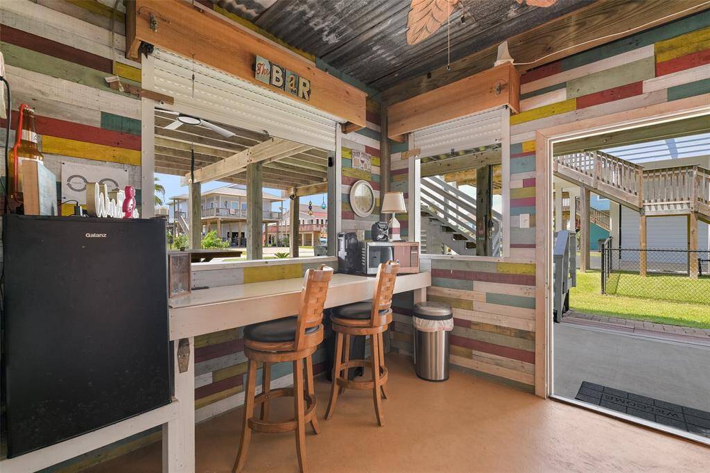 You have a great outdoor bar area with roll up shutters.