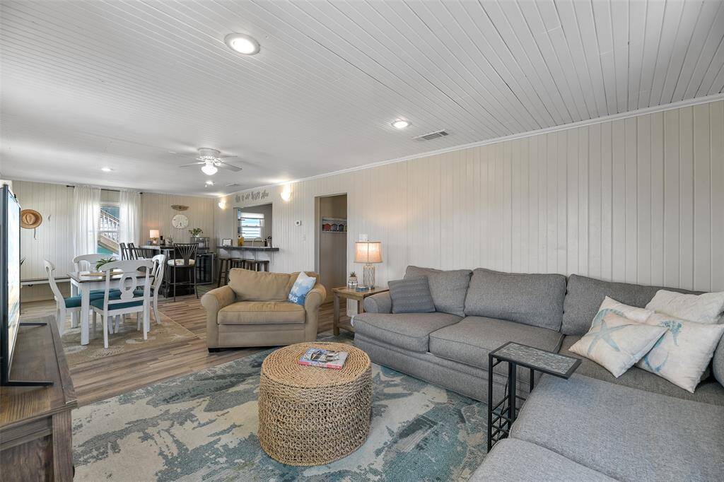 The living space opens directly to the dining area and kitchem!