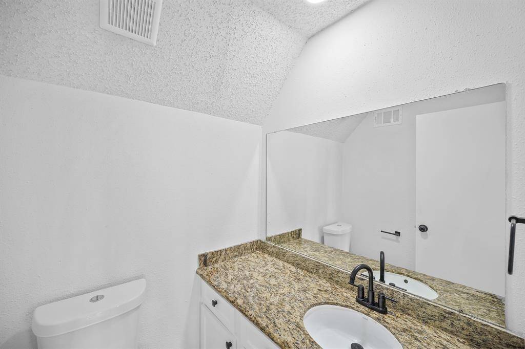 This well-appointed half bathroom is great for when you have family, friends, and guests over.