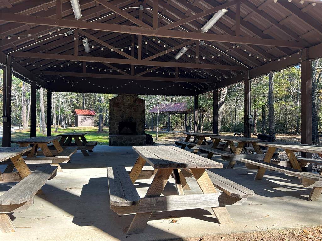 Covered pavilion with picnic tables and fireplace.