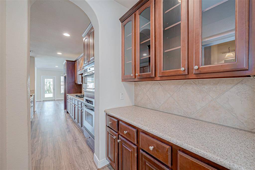 Butler area opens to dining room.