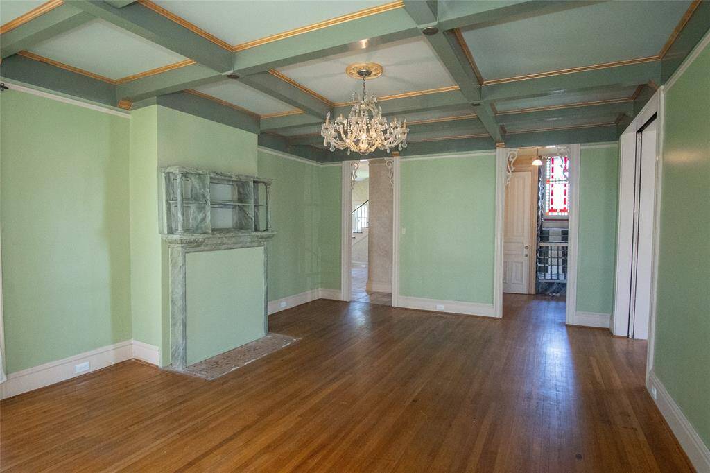 A fabulous view of the formal dining room with an elegant chandelier!