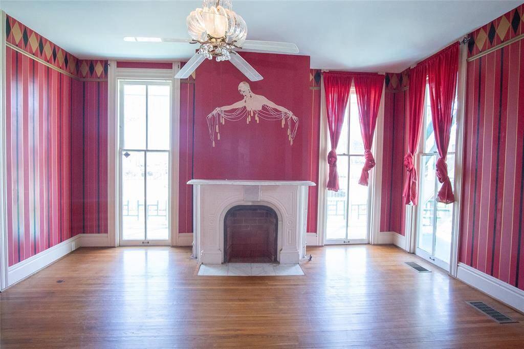 This home exudes classic "Queen Anne" appeal on the exterior with an interior filled with both traditional detailing and modern conveniences.
