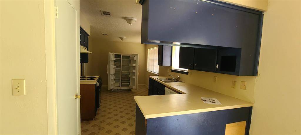 View of kitchen from living room