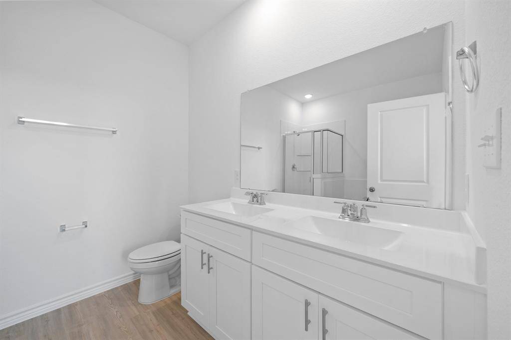 primary ensuite bathroom with garden tub and walk-in shower