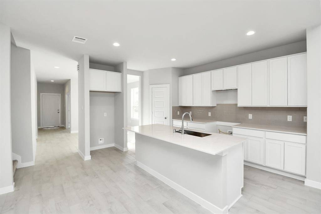 Discover another perspective of this stunning kitchen space!