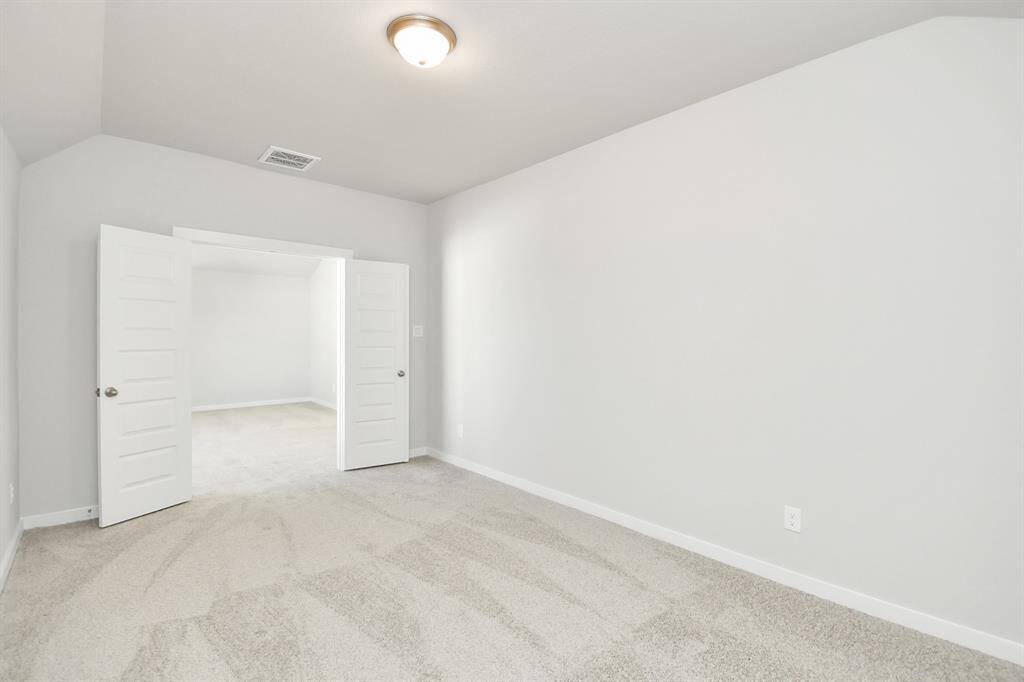 Come upstairs and enjoy  this spacious media room, perfect for movie nights!