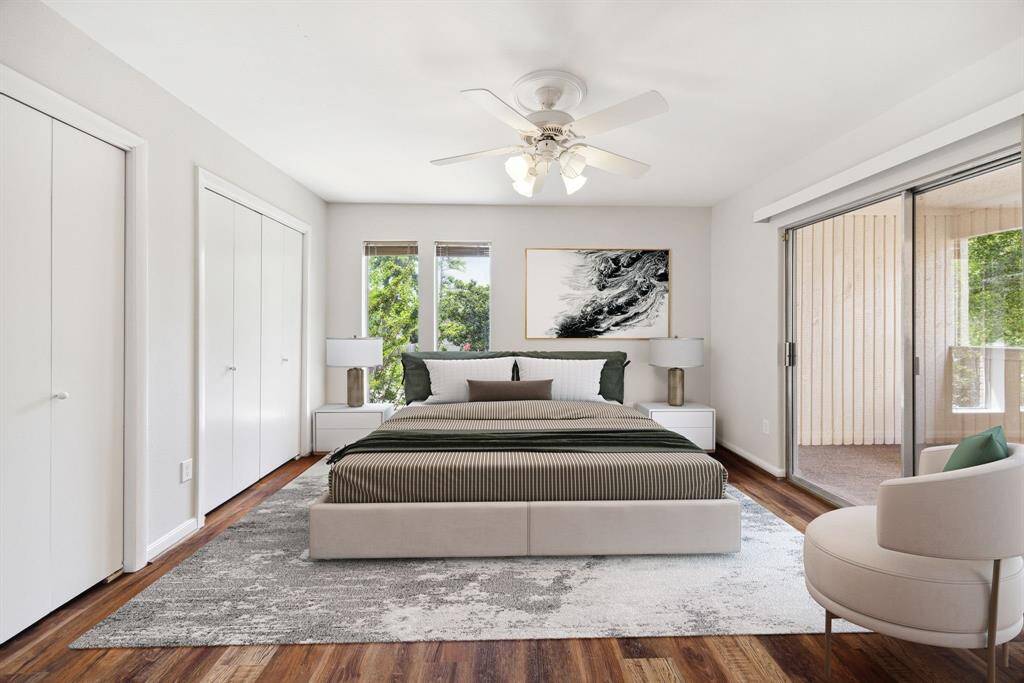 One of two secondary bedrooms upstairs (virtually staged).