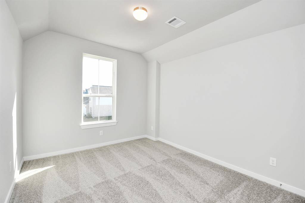 Another view of the secondary bedroom.