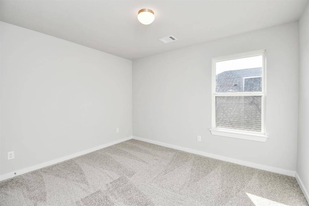 Take another look at the spacious secondary bedroom.