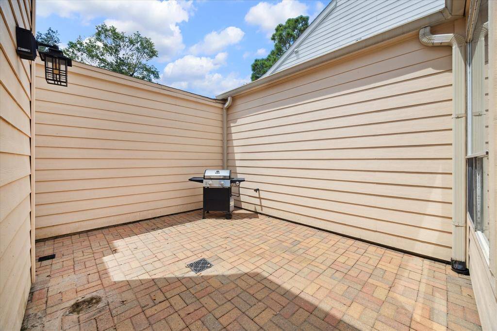 This angle highlights the balcony's depth.  It is accessible from one of the secondary bedrooms.