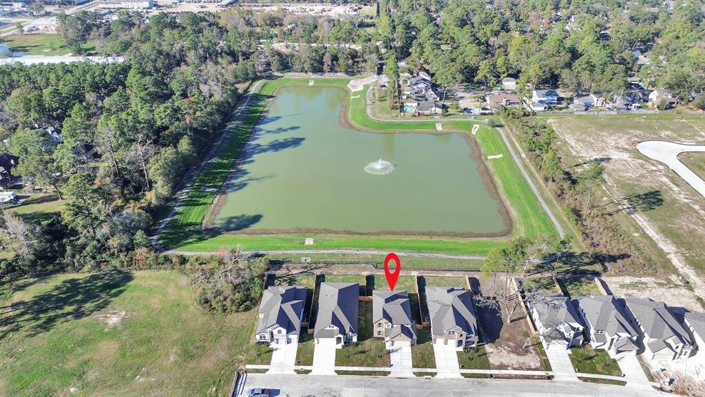 This home sits on a large lot with ample yardspace in front and the back, lush landscaping and a well-maintained yard.