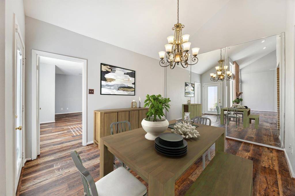 Virtually staged the Dining Room is light, bright, and airy.