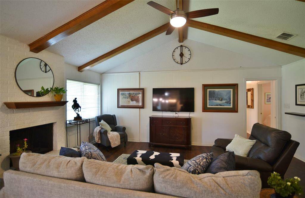 Bricked fireplace and another look at the ceiling beams!