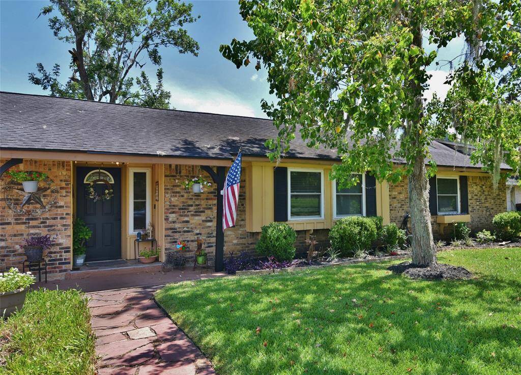 One story brick home with 3 bedrooms, 2 bathrooms, spacious family room and a home office with French doors...