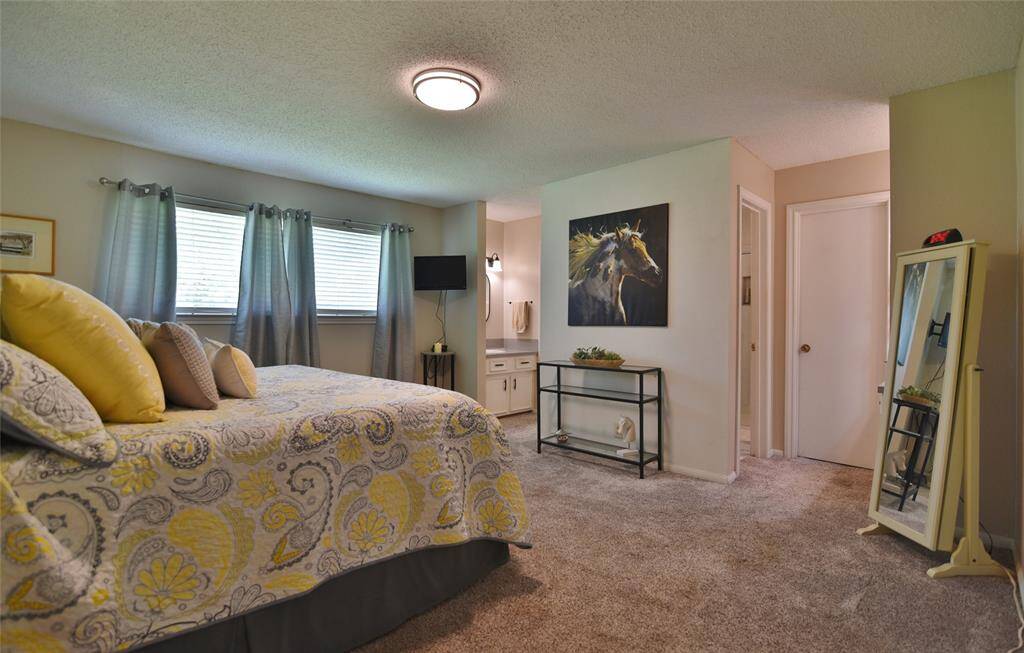 One vanity and closet on the left, and one on the right with the bath in-between.....