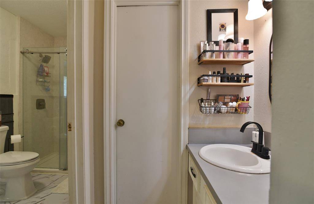 One of the vanity areas with updated faucet and light bar....