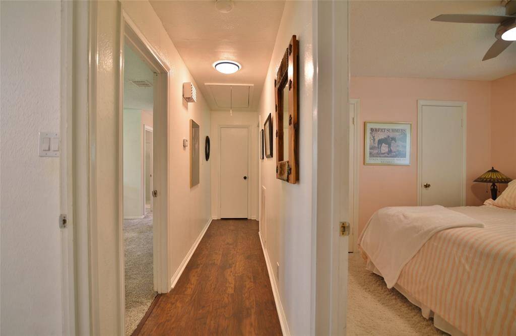 First door on right is the hallway full bath.....one of the secondary bedrooms on the right....