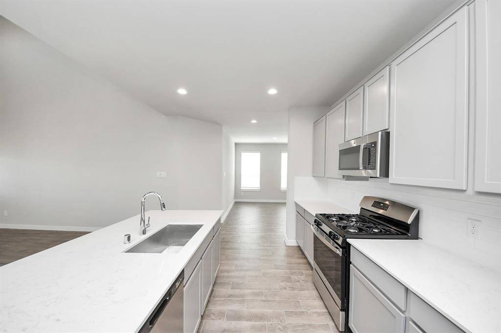 This generously spacious kitchen is a dream realized!