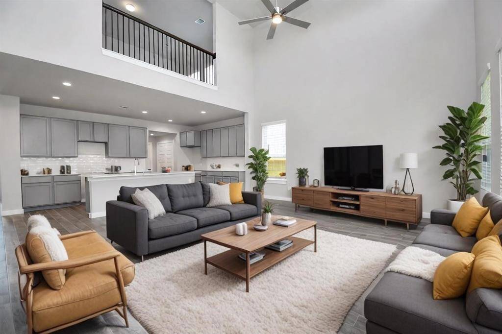 The open concept effortlessly connects the kitchen to the expansive family room, forming a perfect hub for gatherings. This seamless flow creates an inviting space where cooking and socializing come together harmoniously.