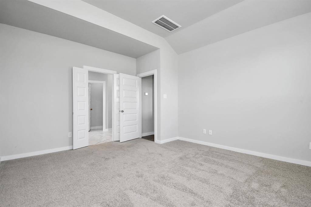 Gather the family and guests together in your lovely living room! Featuring soaring high ceilings, recessed lighting, ceiling fan, custom paint, gorgeous floors, and large windows that provide plenty of natural lighting throughout the day.