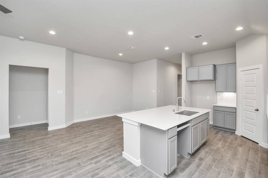 This generously spacious kitchen is a dream realized!