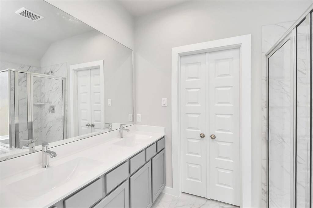 Indulge in a spa-like retreat within the confines of this primary bathroom.