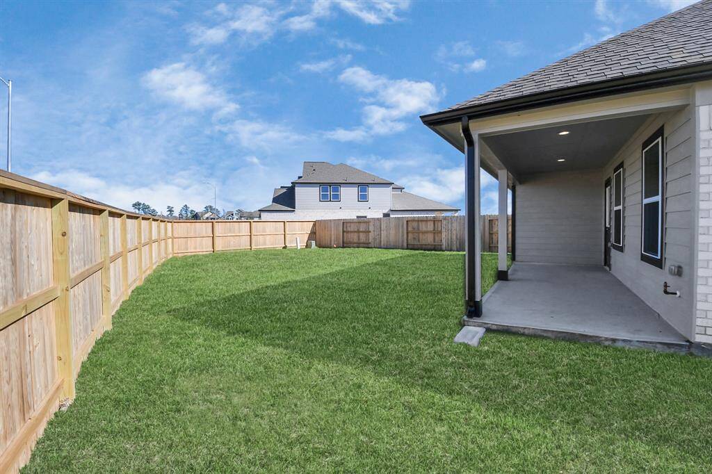 Come and see this spacious backyard with its beautiful covered patio. There is plenty ofroom for the kids to play and adults to relax. Perfect for your outdoor living space, patiofurniture, bbq pit, and so much more. The possibilities are endless!