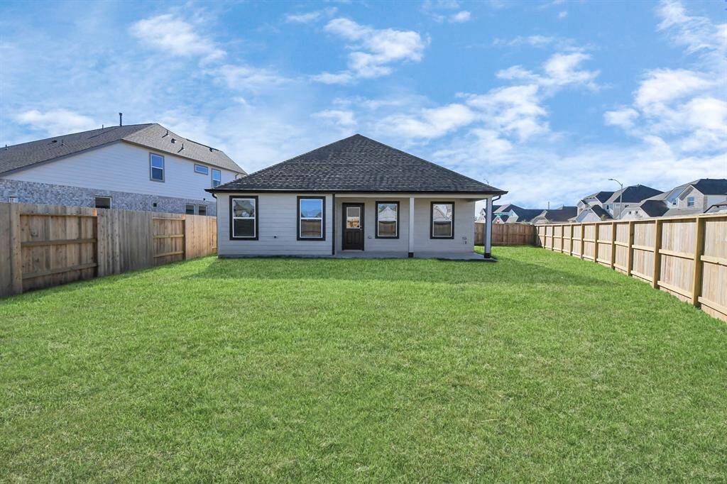 Come and see this spacious backyard with its beautiful covered patio. There is plenty ofroom for the kids to play and adults to relax. Perfect for your outdoor living space, patiofurniture, bbq pit, and so much more. The possibilities are endless!