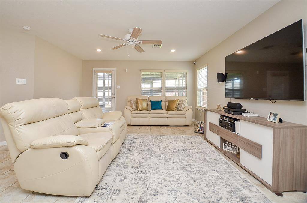 Open room concept from kitchen into den
