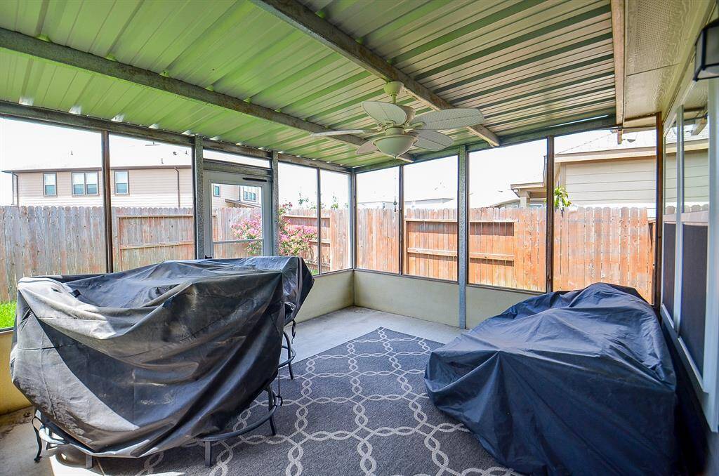 Great Screened in porch, with a roof, and with plenty of space to barbeque/grill!