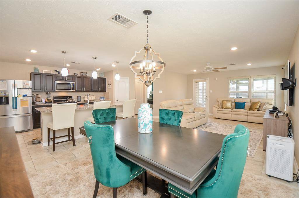 Cozy dining room in the open concept kitchen, family room