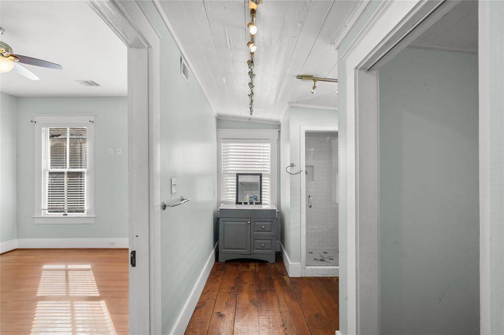 bathroom with connections for a stackable washer and dryer