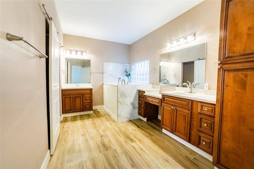 Primary bathroom! Seller is giving concessions to put a new shower in where the old shower was. Plumbing still in the wall.