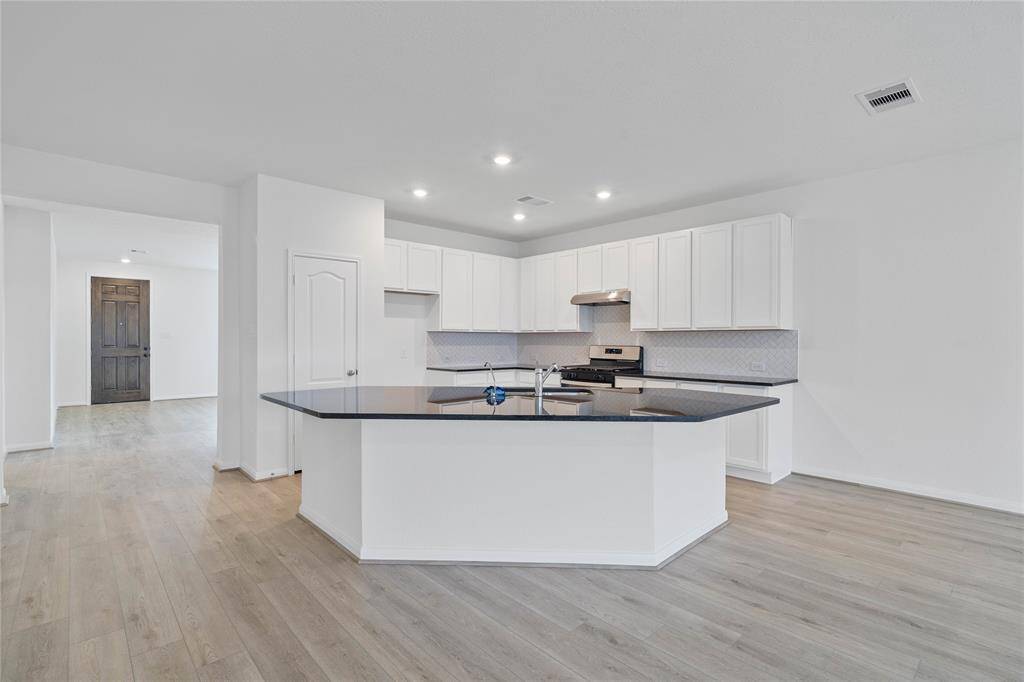 This amazing extended counter space is perfect for a breakfast bar or to spread out your dishes during a party!
