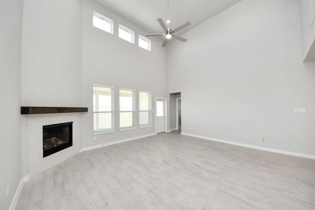 A perfect blend of functionality and comfort. Capture the essence of easy living with a first-floor laundry room, thoughtfully equipped with shelving for effortless organization. Both electric and gas connections available.