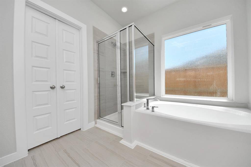 Come upstairs and enjoy a day of leisure in this fabulous game room! This is the perfect hangout spot or adult game room! Features plush carpet, high ceilings, custom paint and windows for plenty of natural light.