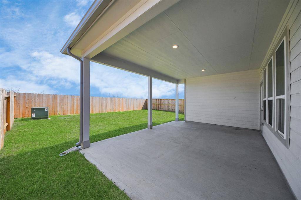 Come and see this spacious backyard with its beautiful covered patio. There is plenty of room for the kids to play and adults to relax. Perfect for your outdoor living space, patio furniture, bbq pit, and so much more. The possibilities are endless!