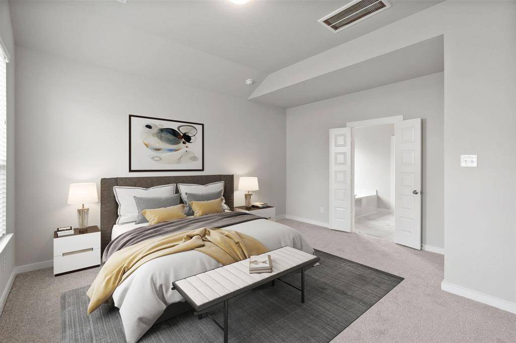 Quietly nestled in front of the home is the sophisticated home office. Featuring custom paint and large window with privacy blinds.
