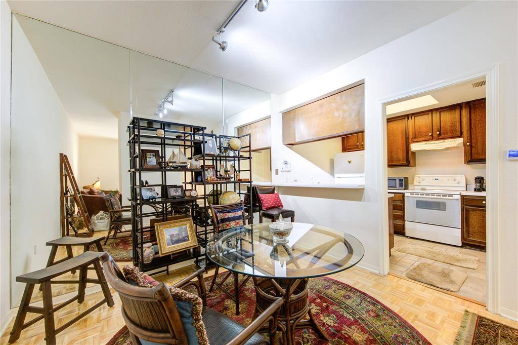 From the breakfast/dining room, you can enjoy an open view into the kitchen, highlighting the seamless flow and connectivity between these inviting spaces.