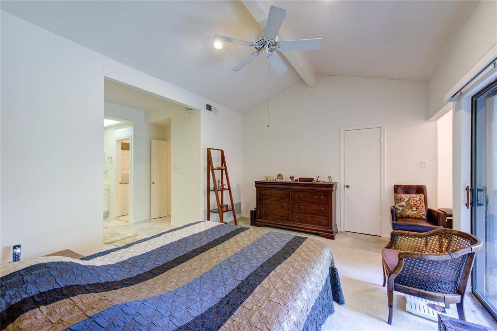 The primary bedroom offers a serene retreat with direct access to a spacious walk-in closet to the left, a small closet (center) by the home office (left), and a primary bathroom also to the left. Stairs lead to the first floor, enhancing both convenience and comfort.
