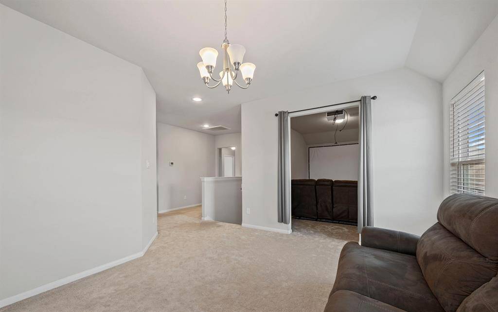 This is a view of the staircase media room and the game room.