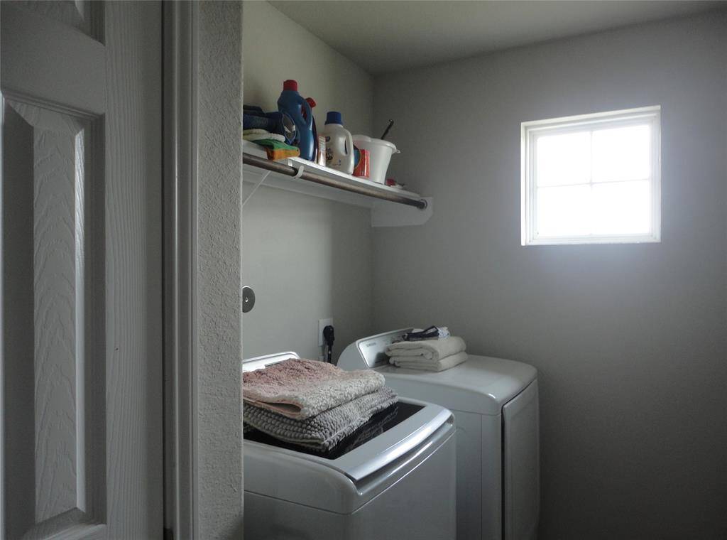 The utility room is on the second floor where it is needed, by the kids rooms. Teach them how to do their own laundry.