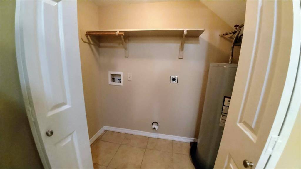 Maximize your space with a laundry closet in an unexpected place?  This full-size washer/dryer unit fits perfectly in the stairwell next to the kitchen, making laundry day a breeze.