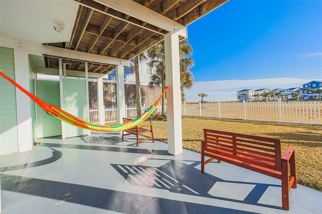 Ground level, fully fenced yard and an oversized porch make it the ideal place for family to spend nights together